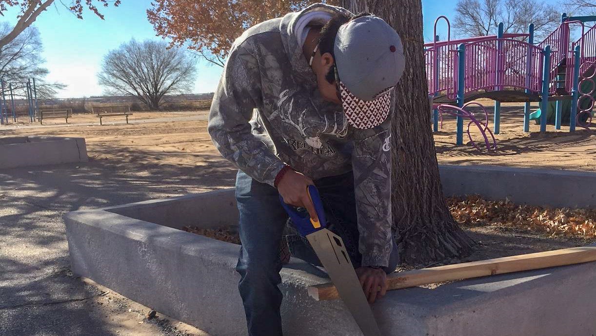 MIchael Zuni sawing lumber-1 (2).jpg